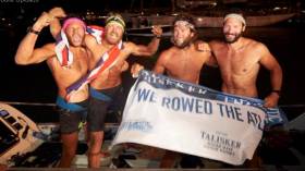 The Four Oarsmen celebrate their record-breaking win.