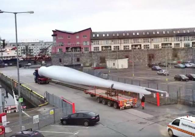Still from a time lapse video showing one of the massive turbine blades on Galway's dockside last winter