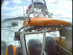The Skerries inshore lifeboat takes the motor boat under tow to Rush