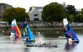 The CityOne Training Dinghies designed by Theo Rye on the Shannon in Limerick in company with one of the Ilen Boatbuilding Company’s new-built traditional gandelows in September 2014