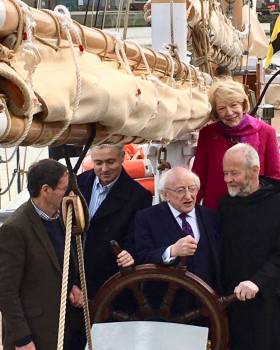 Aboard Ilen in Limerick Docks are (left to right) boatbuilder Liam Hegarty of Baltimore, Gary MacMahon of the Ilen Project, President Higgins, Brother Anthony Keane of Glenstal Abbey, and Sabina Higgins