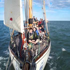 Summertime at Arklow. The vintage Arklow-built Round Ireland racer Maybird takes the local Sea Scouts for a sail as part of the celebration of her achievement in becoming the oldest and first gaff-rigged boat to complete the Round Ireland race