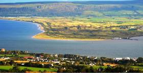 Lough Foyle is the estuary of the River Foyle separating Northern Ireland from the Republic